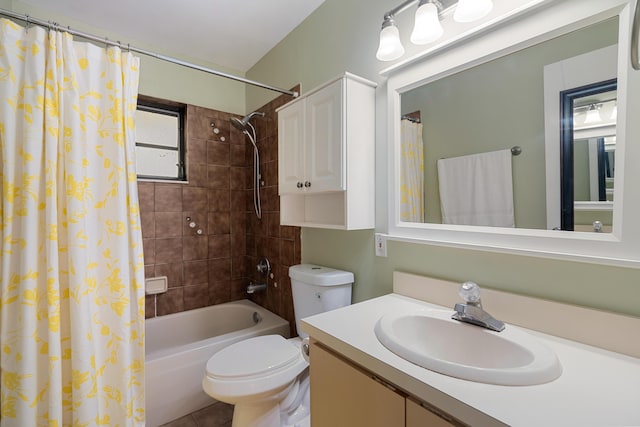 full bathroom with vanity, tile patterned floors, shower / bath combination with curtain, and toilet