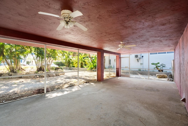 view of patio / terrace featuring ceiling fan