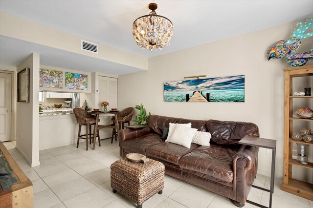 64 Seaside N Ct, Key West, FL 33040 - living area with a chandelier and light tile patterned floors