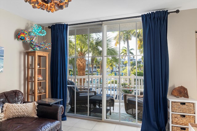 64 Seaside N Ct, Key West, FL 33040 - doorway with light tile patterned flooring and healthy amount of natural light
