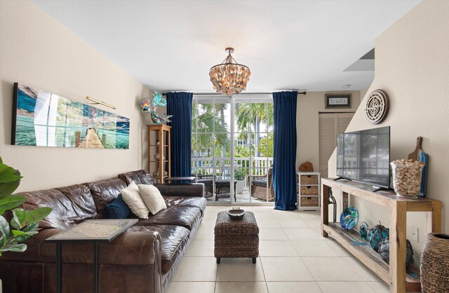 64 Seaside N Ct, Key West, FL 33040 - living area with a chandelier and light tile patterned flooring