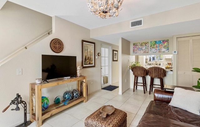 64 Seaside N Ct, Key West, FL 33040 - living area with a chandelier and tile patterned flooring