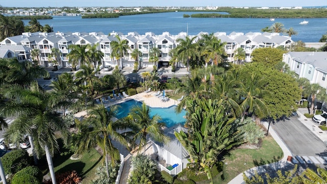 64 Seaside N Ct, Key West, FL 33040 - aerial overview of property's location with nearby suburban area, a nearby body of water, and a pool