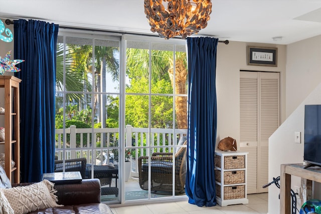 64 Seaside N Ct, Key West, FL 33040 - sitting room with tile patterned flooring, plenty of natural light, and a chandelier
