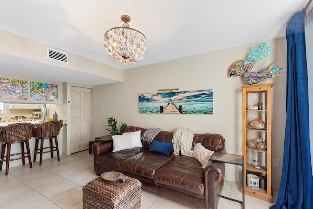 64 Seaside N Ct, Key West, FL 33040 - living room with light tile patterned flooring and a chandelier
