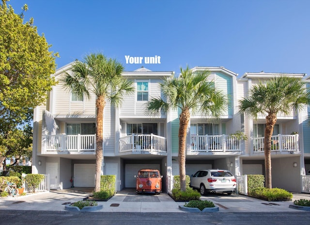 64 Seaside N Ct, Key West, FL 33040 - view of property featuring a garage and driveway