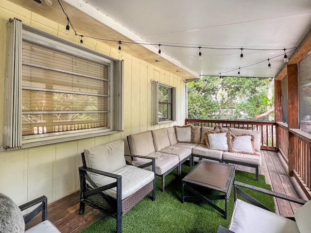 wooden deck featuring an outdoor hangout area