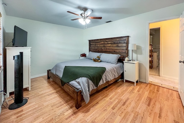 bedroom featuring ceiling fan and light wood-type flooring