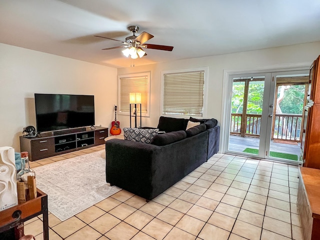 tiled living room featuring ceiling fan