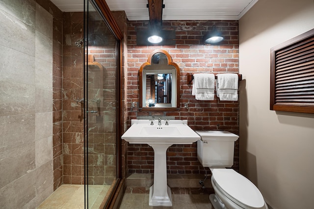 bathroom featuring an enclosed shower and toilet