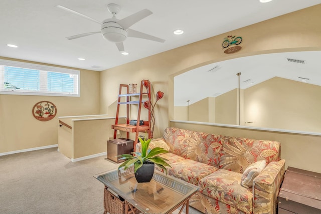 living area featuring carpet floors, ceiling fan, baseboards, and recessed lighting