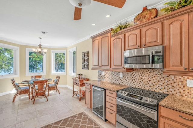 kitchen with wine cooler, decorative backsplash, stainless steel appliances, and crown molding