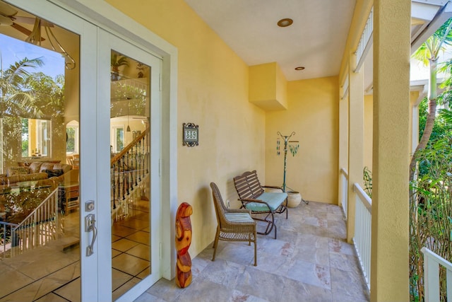 balcony featuring french doors