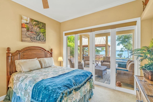 bedroom featuring light colored carpet, access to outside, multiple windows, and crown molding