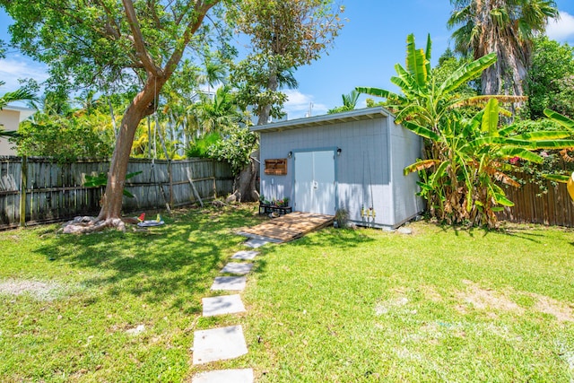 15 Cactus Dr, Big Coppitt, FL 33040 - fenced backyard featuring a storage unit