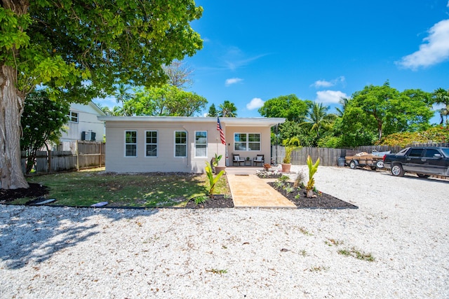 15 Cactus Dr, Big Coppitt, FL 33040 - view of front of house with a patio