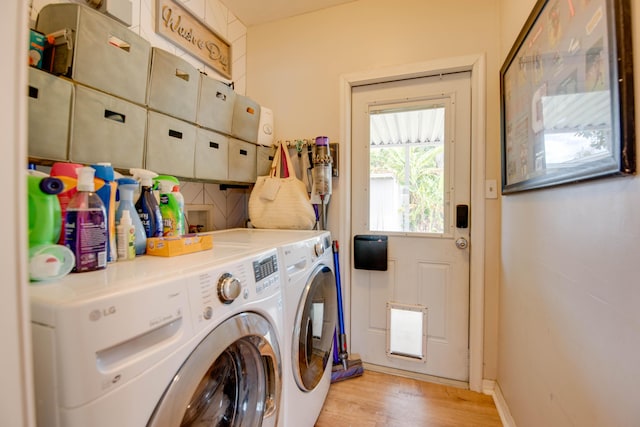 15 Cactus Dr, Big Coppitt, FL 33040 - washroom with separate washer and dryer and light wood finished floors