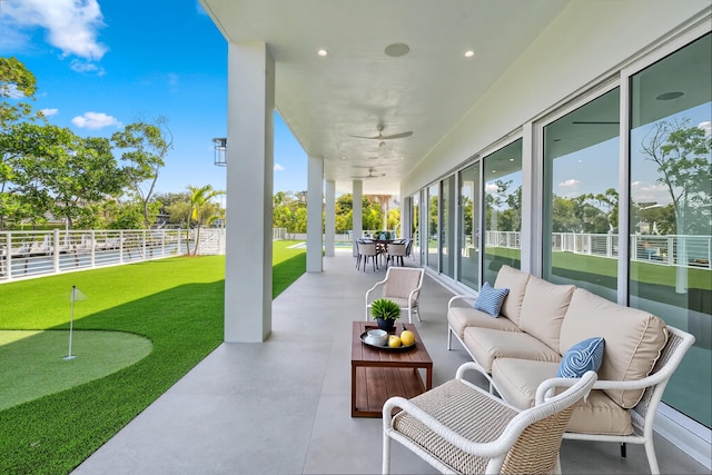 194 Buttonwood Ln, Islamorada, FL 33036 - view of patio / terrace with an area to practice putting, outdoor lounge area, and a ceiling fan