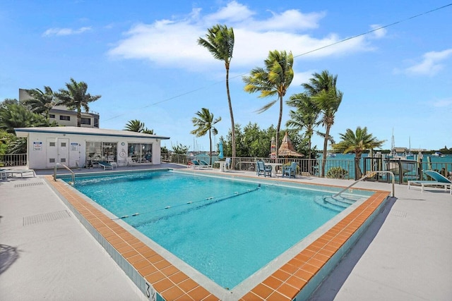 view of swimming pool with a patio area