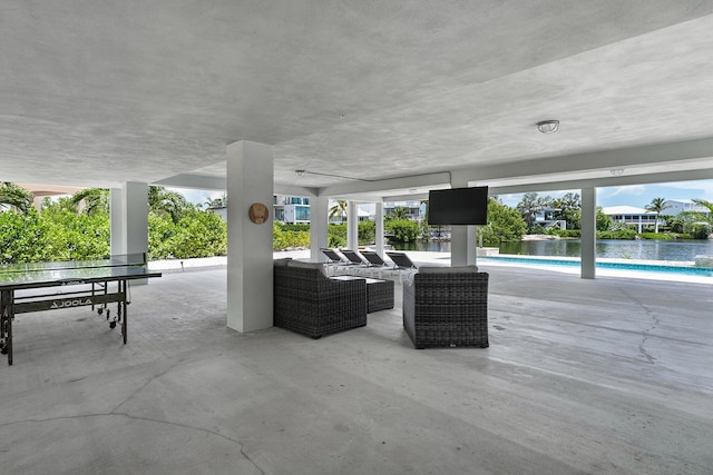 view of patio / terrace featuring an outdoor pool