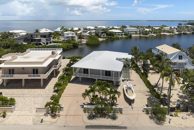 aerial view with a residential view and a water view