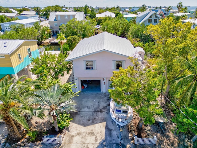 birds eye view of property with a residential view