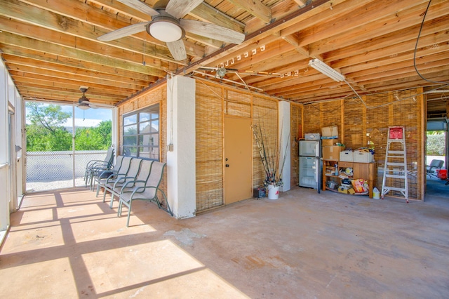 interior space featuring a ceiling fan