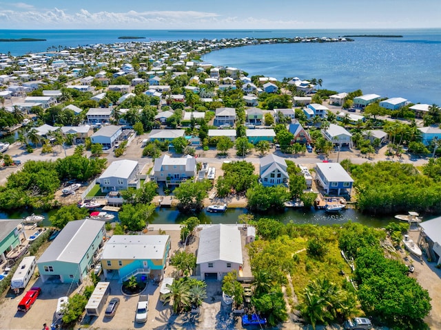 aerial view featuring a water view and a residential view