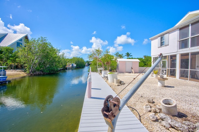 view of dock with a water view