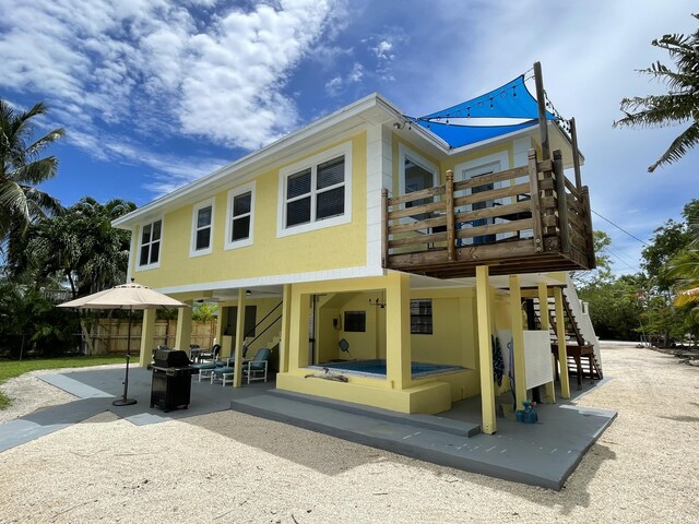 rear view of house with a patio area