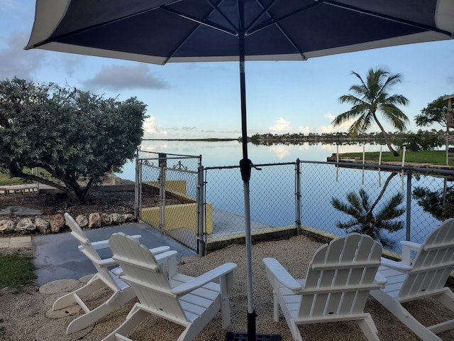 view of patio featuring a water view