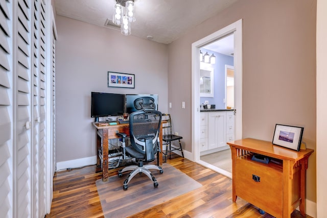 office space featuring hardwood / wood-style floors