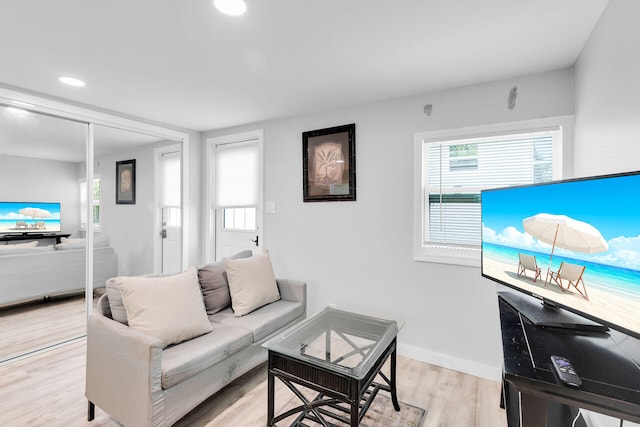 2211 Staples Ave, Key West, FL 33040 - living area featuring recessed lighting, baseboards, plenty of natural light, and light wood finished floors