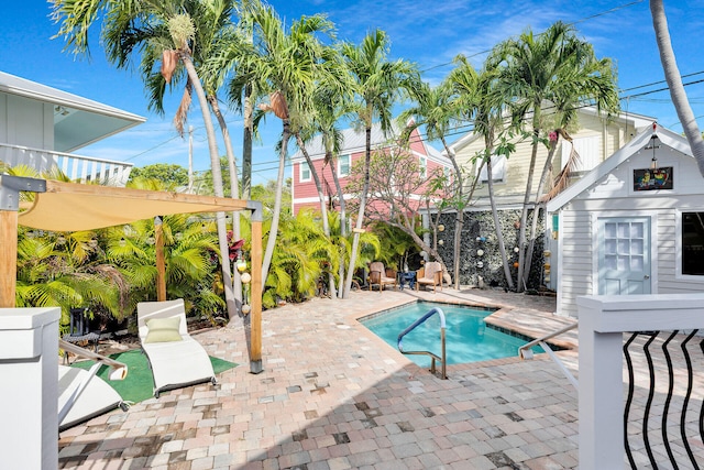 pool featuring a patio area