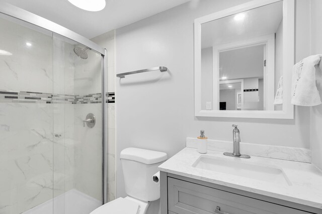 2211 Staples Ave, Key West, FL 33040 - full bath featuring vanity, toilet, and a shower stall