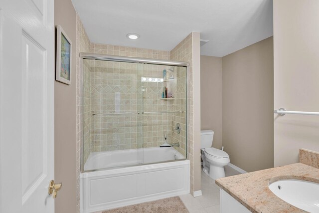 120 9th St, Key Colony, FL 33051 - bathroom featuring vanity, enclosed tub / shower combo, and tile patterned floors
