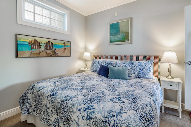 bedroom featuring crown molding and carpet floors