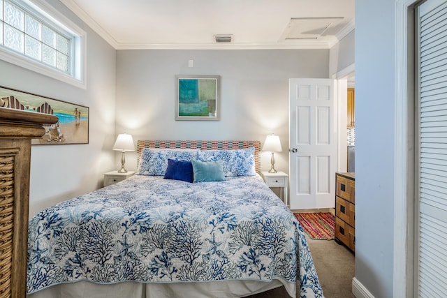 bedroom featuring light colored carpet, ornamental molding, and a closet