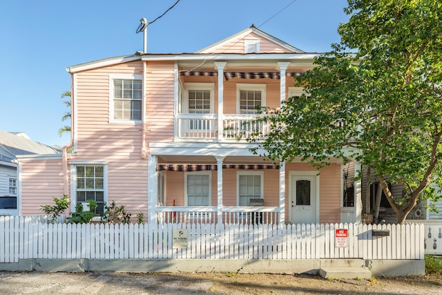 view of front facade featuring a porch and a balcony