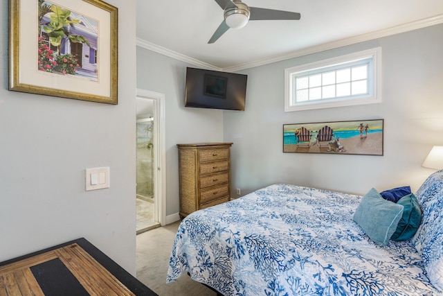 bedroom with ceiling fan, light colored carpet, ornamental molding, and connected bathroom