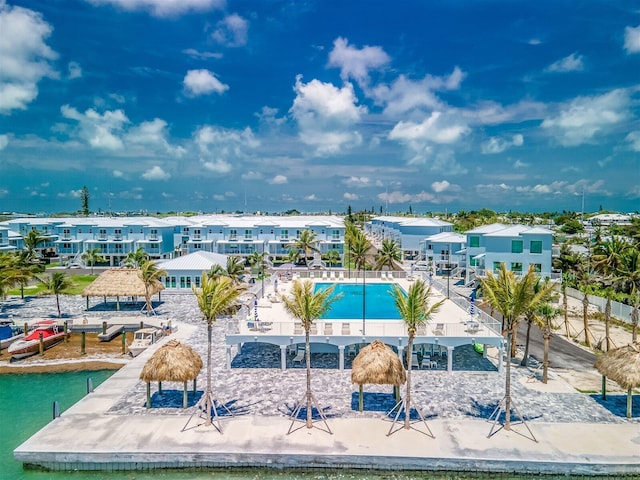 view of pool with a water view