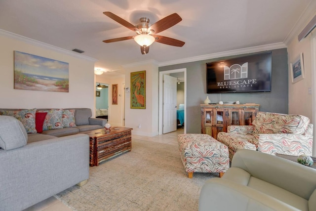 living room featuring ornamental molding, ceiling fan, and light tile patterned flooring