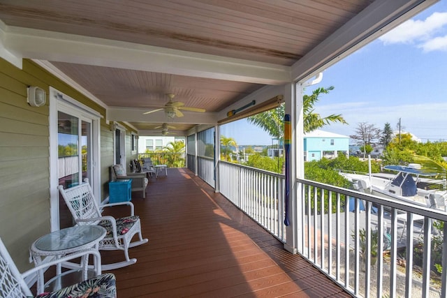 wooden terrace with ceiling fan