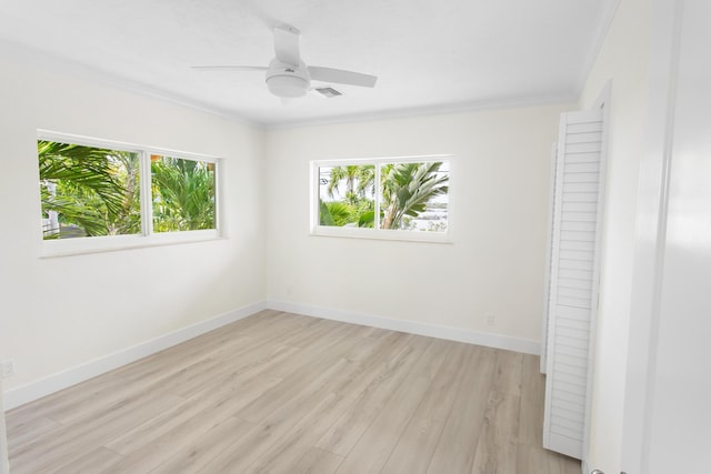 365 Pirates Rd, Little Torch, FL 33042 - empty room featuring crown molding, light wood-style flooring, a ceiling fan, baseboards, and visible vents