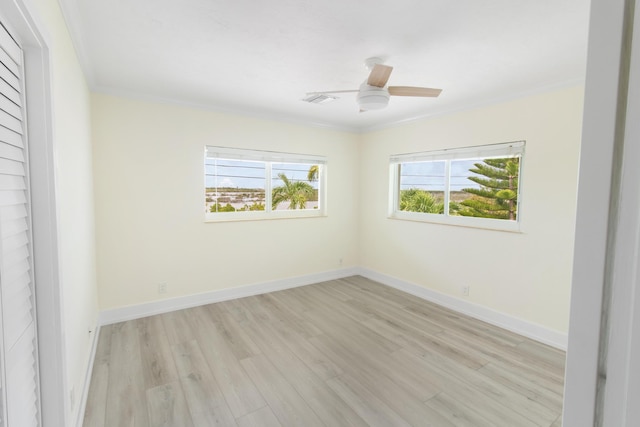 365 Pirates Rd, Little Torch, FL 33042 - empty room featuring crown molding, a ceiling fan, baseboards, and light wood-style floors