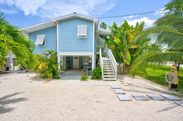 22841 Buccaneer Ln, Cudjoe, FL 33042 - coastal inspired home featuring stairs