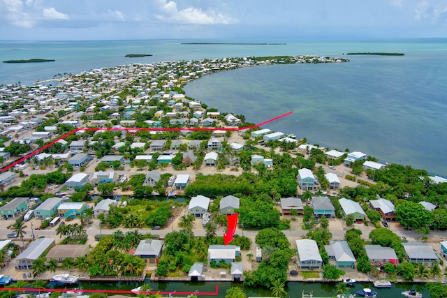 22841 Buccaneer Ln, Cudjoe, FL 33042 - aerial view of property and surrounding area featuring a nearby body of water and nearby suburban area