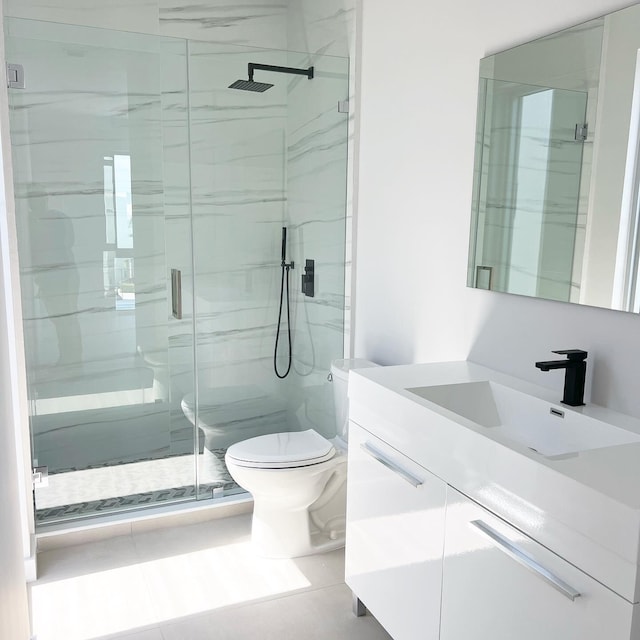 94825 Overseas Hwy Unit 108, Key Largo, FL 33037 - bathroom with toilet, vanity, and a stall shower