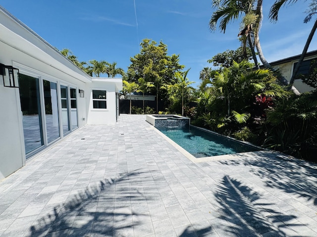 1708 Duncan St, Key West, FL 33040 - view of swimming pool featuring a pool with connected hot tub and a patio area