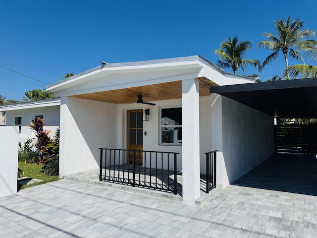 1708 Duncan St, Key West, FL 33040 - doorway to property featuring a porch and stucco siding